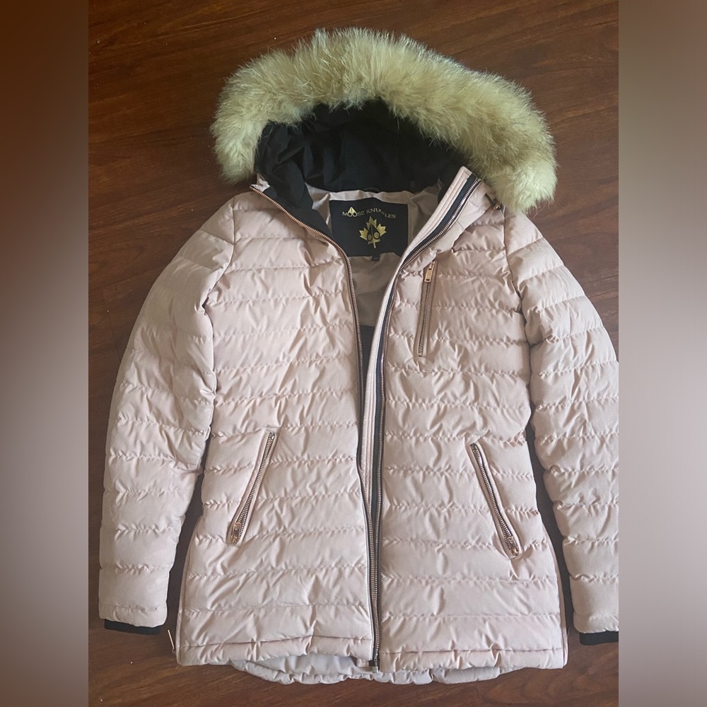 Moose knuckle rose lawn padded jacket.
Pink color. 
Original price : $816